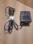 Net Bit DV-0555R-1 Ac Power Supply Adaptor Charger Output: 5.2VDC 500MA Palmone. Fixed Price $10.99.