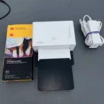 Imation Smartphone White Photo Printer PD460 Bundle, Power Supply And Paper. Fixed Price $49.99.